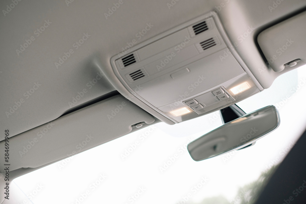 Modern car interior, rear-view mirror with dimming function, LED interior lighting. Modern car interior, rear-view mirror with dimming function, LED interior lighting.