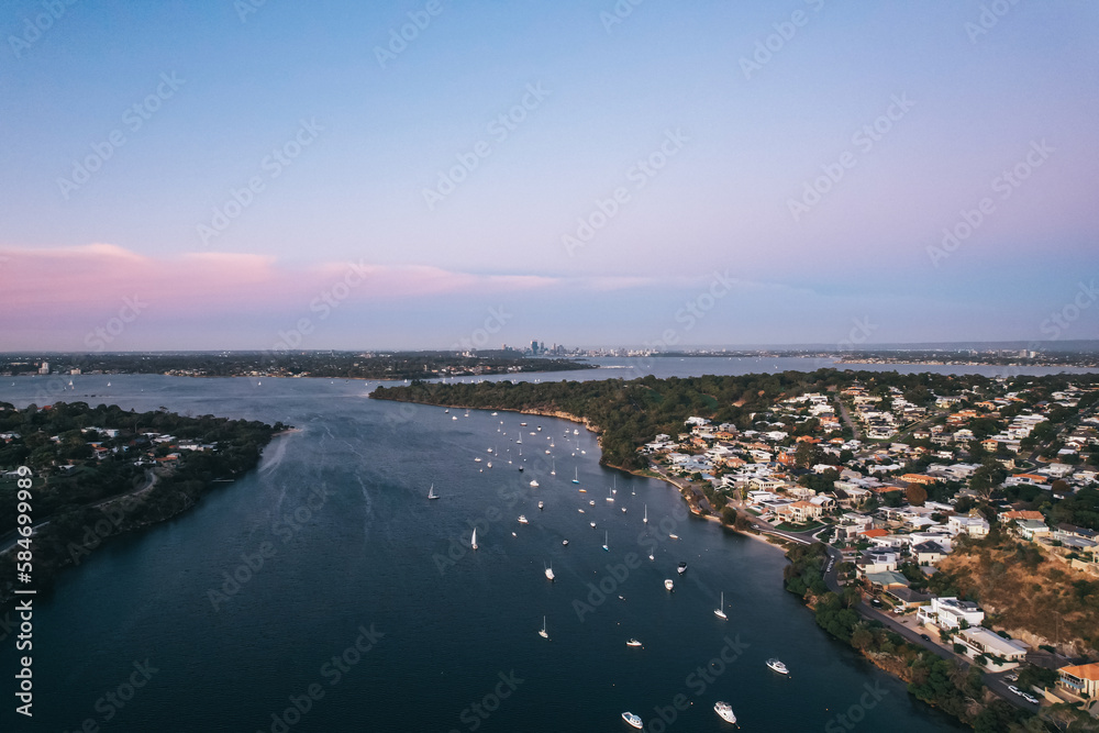 Aerial view along the Swan River from Bicton in Perth at sunset.
