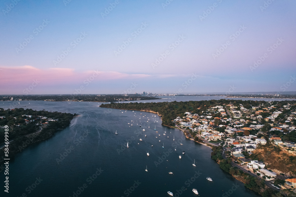 Aerial view along the Swan River from Bicton in Perth at sunset. Aerial view along the Swan River from Bicton in Perth at sunset.