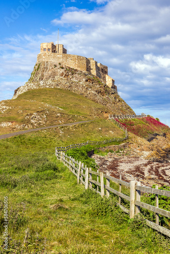 Approach to Lindisfarne Castle on Holy Island  off the Northumberland coast in the north east of England.