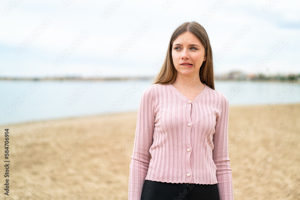 Young pretty blonde woman with confuse face expression Young pretty blonde woman with confuse face expression