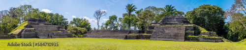 A panorama view across the first plaza in the ancient Mayan city ruins of Altun Ha in Belize on a sunny day