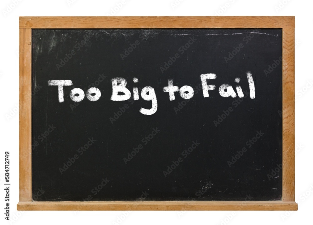Fototapeta premium Too Big to Fail written in white chalk on a black chalkboard isolated on white
