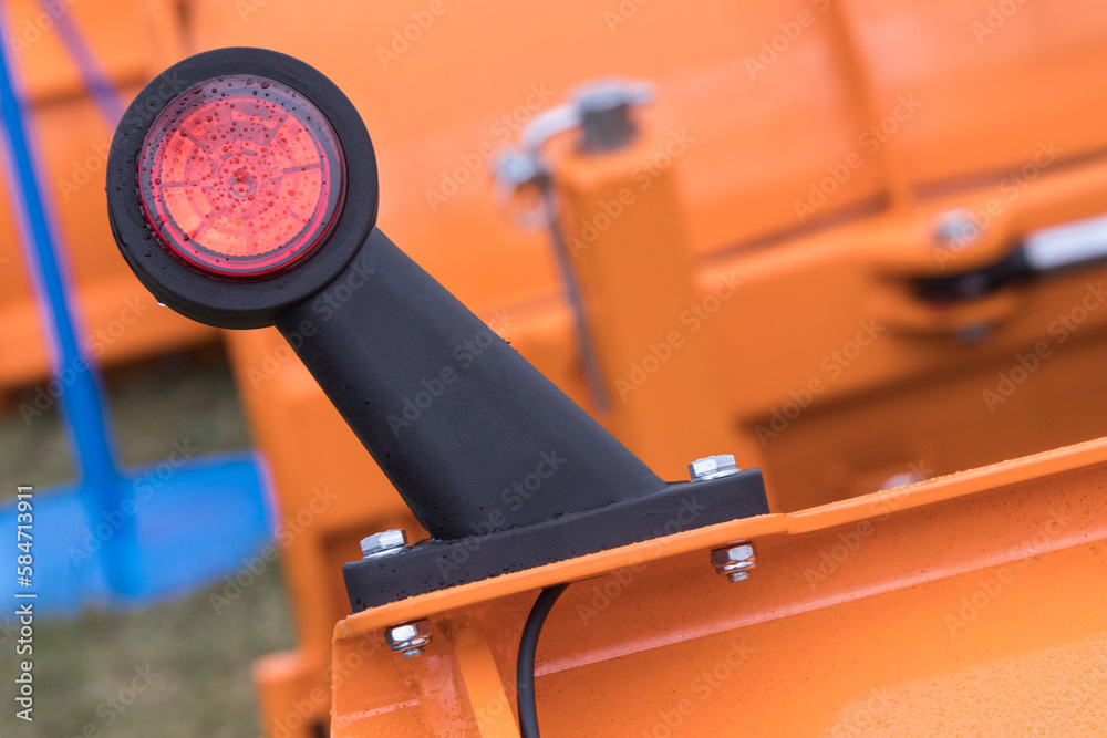 Warning red light of truck, tractor or other machine. Safety in transport Warning red light of truck, tractor or other machine. Safety in transport