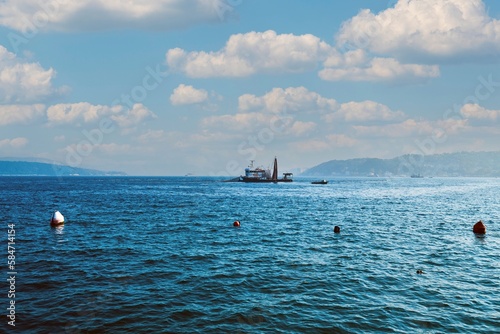 a fishing boat fishing in the middle of the sea