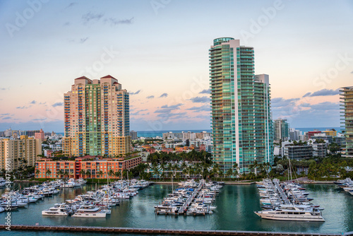 Marina in Miami Beach with the Miami skyline in the background at sunset © crazymonkstudio