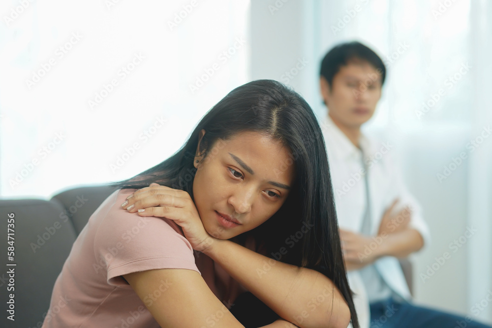 Close up sadly Asian couple has a relationship problem Close up sadly Asian couple has a relationship problem