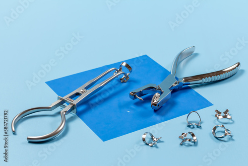 Dental hole punch, the clamps and the rubber dam forceps