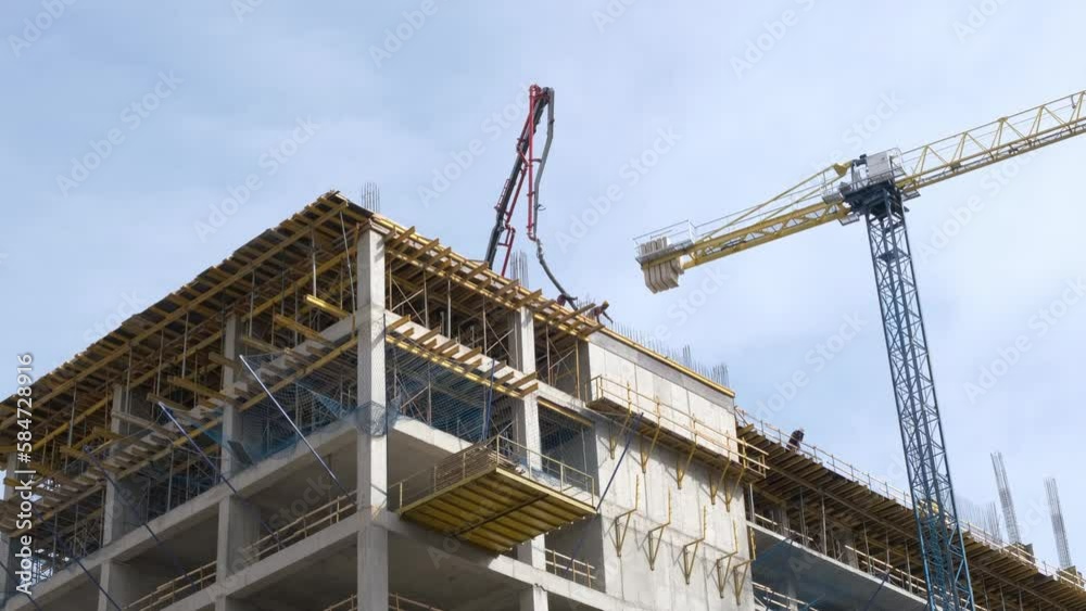 Workers make a strapping of rebar for pouring concrete. Workers make a strapping of rebar for pouring concrete.