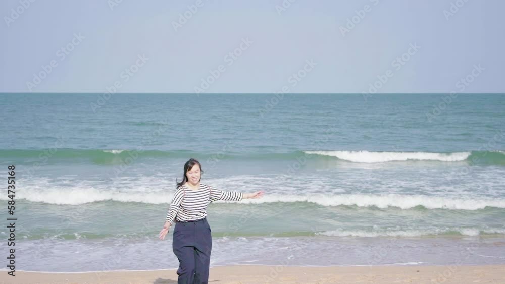 Woman traveling to the beach, taking pictures and videocall Woman traveling to the beach, taking pictures and videocall