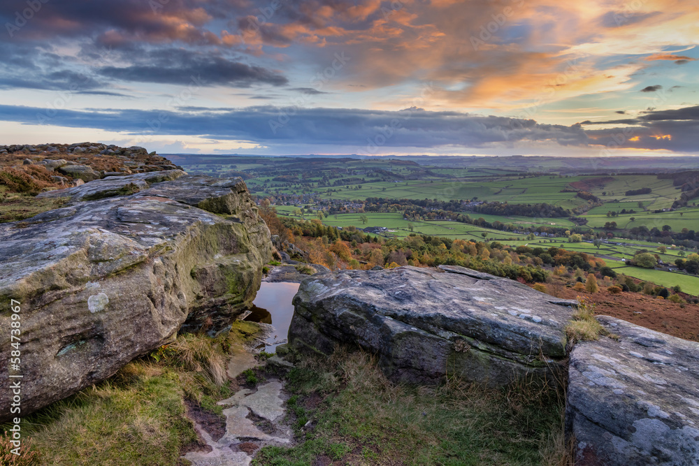 Baslow Edge at sunset, providing amazing views across the Derwent Valley in the Peak District National Park, Derbyshire.