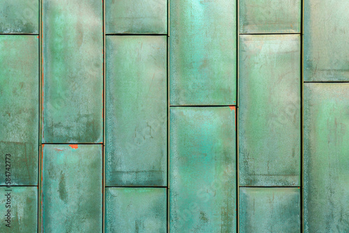 Texture of copper plates with oxidized verdigris layer