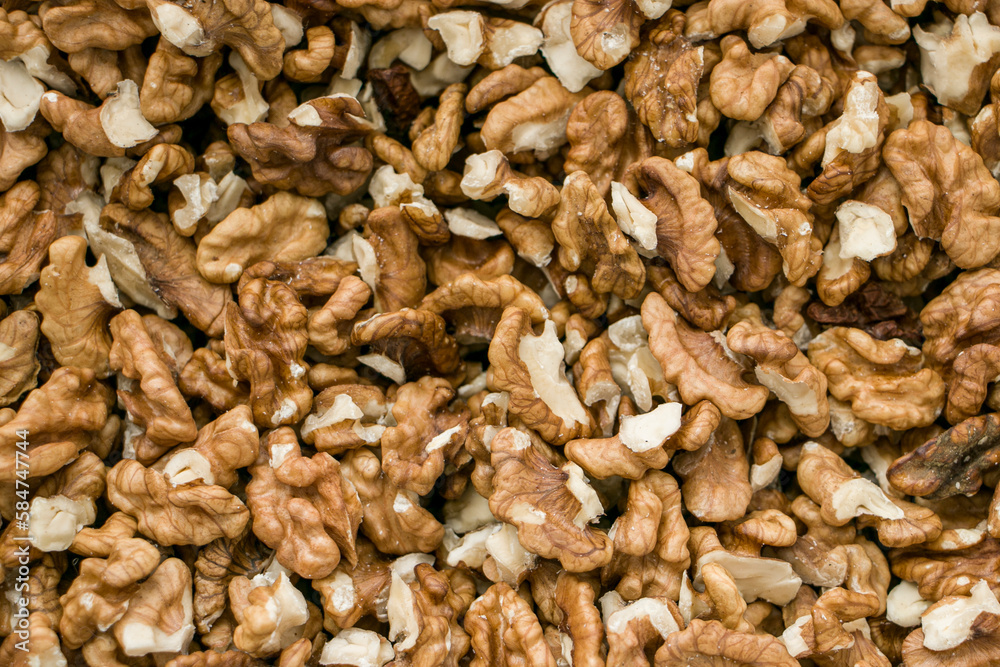Selective focus. Peeled walnut kernels. Background from walnut kernels. Peeled walnuts. Selective focus. Peeled walnut kernels. Background from walnut kernels. Peeled walnuts.