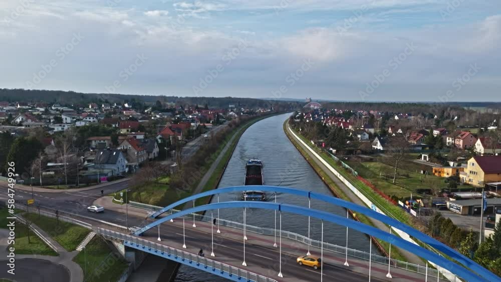 Drone shot of cargo ship shipping coal in Mittelland Canal, Haldensleben, Saxony-Anhalt, Germany . Drone shot of cargo ship shipping coal in Mittelland Canal, Haldensleben, Saxony-Anhalt, Germany .