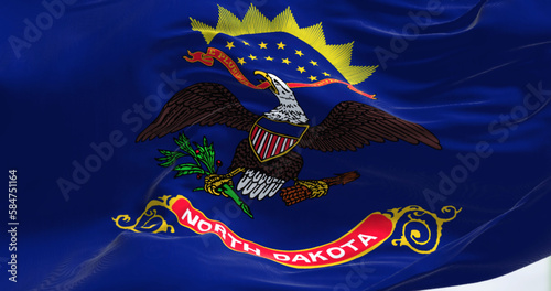 Close-up view of the North Dakota state flag fluttering