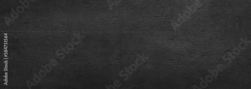 black concrete wall, stone grunge texture, dark gray rock surface background panoramic wide banner 