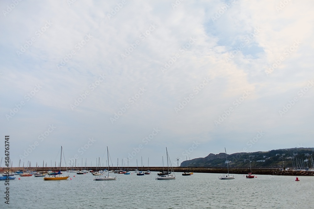 Sailing boats in marina of Howth. Cloudy day in Howth, Dublin, Ireland. 
