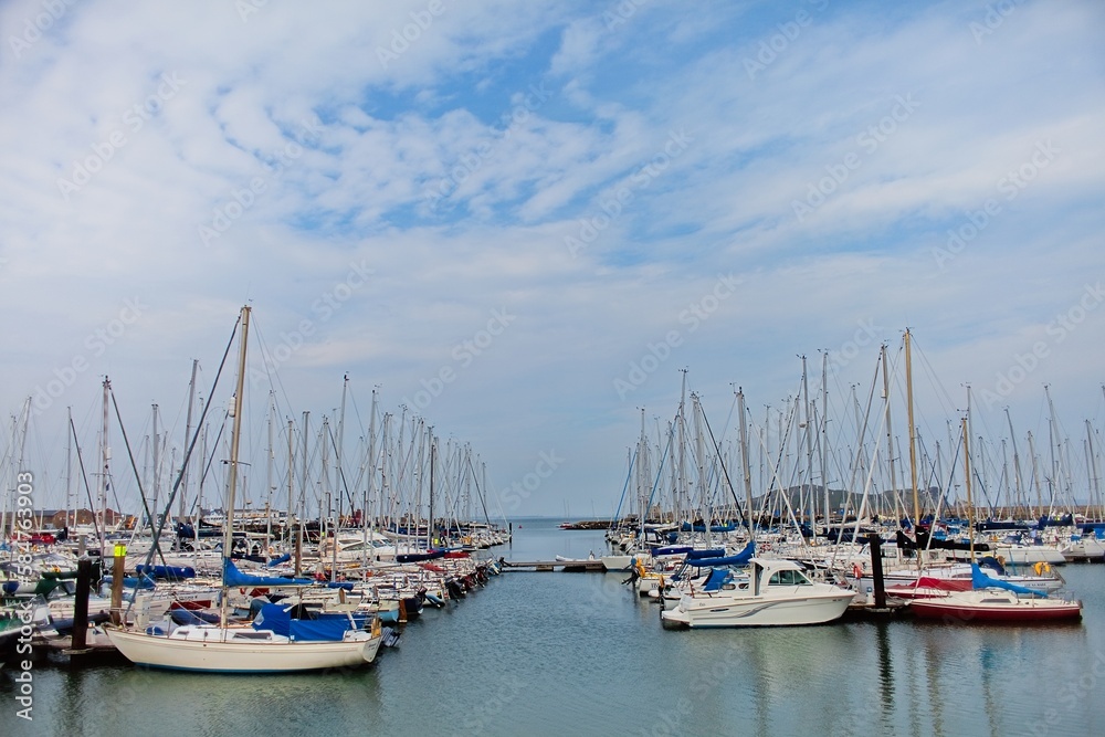 Sailing boats in marina of Howth. Cloudy day in Howth, Dublin, Ireland. 