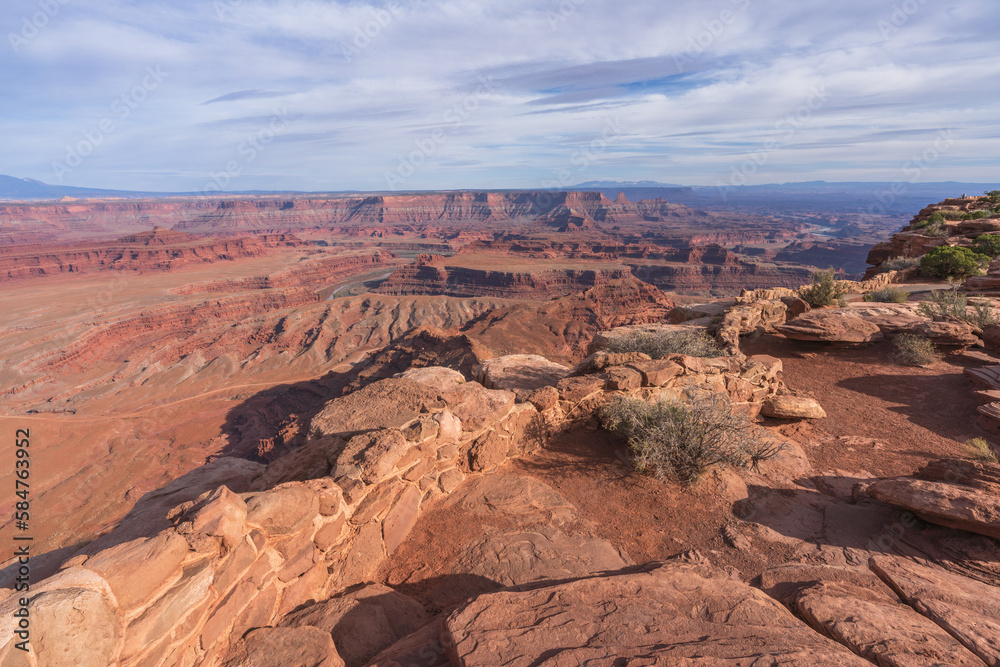 hiking the dead horse trail in dead horse point state park in utah, usa hiking the dead horse trail in dead horse point state park in utah, usa