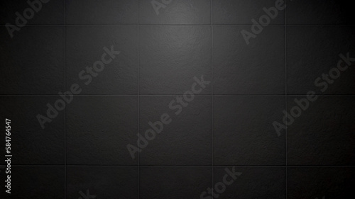 slate tile ceramic for industrial interior decoration style. close up dark black square tile pattern with light from above used as background. large rustic bathroom tile pattern.
