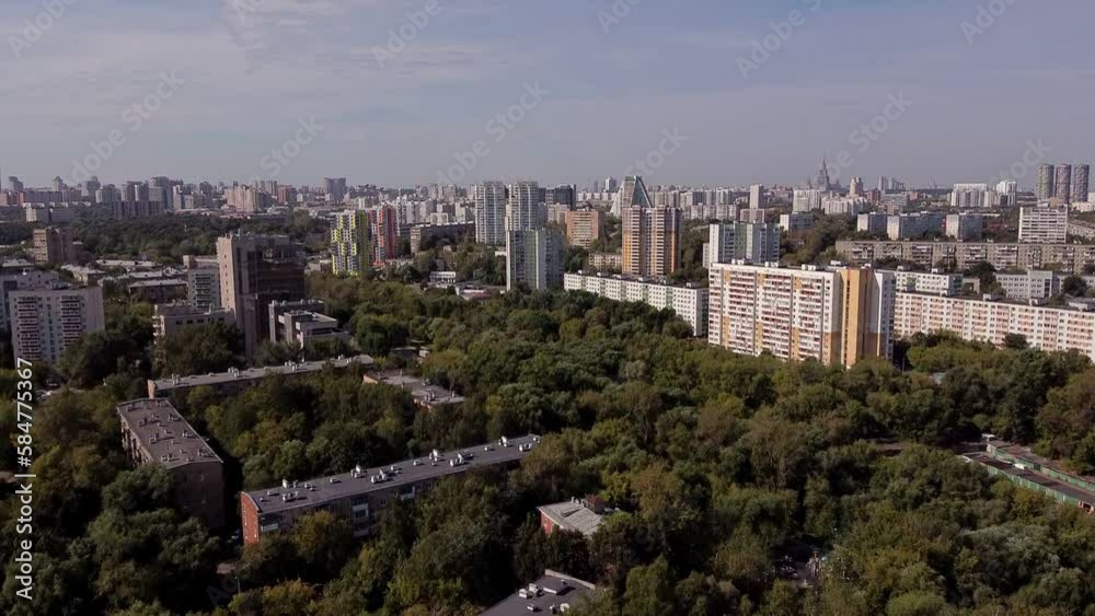 Air view of an ecologically clean sleeping area of Moscow. Modern houses in a developed quarter of the metropolis. Residential buildings near the forest Air view of an ecologically clean sleeping area of Moscow. Modern houses in a developed quarter of the metropolis. Residential buildings near the forest