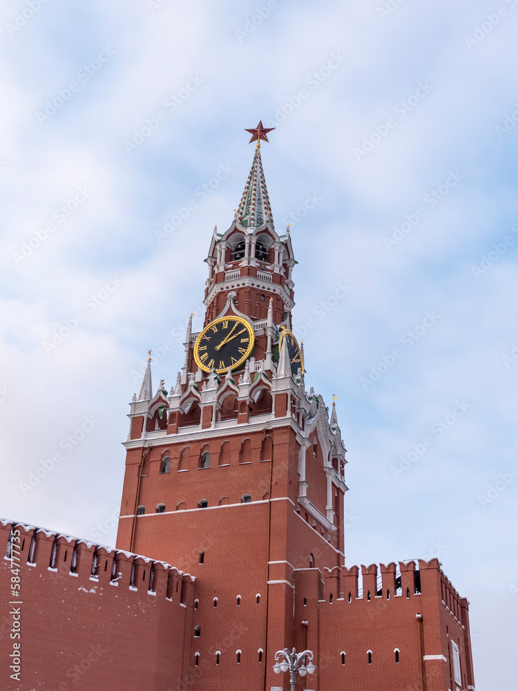 MOSCOW , RUSSIA, June 10, 2022: Ruby star on the spire of the Spasskaya Tower of the Moscow Kremlin on June 10, 2022 in Moscow, Russia