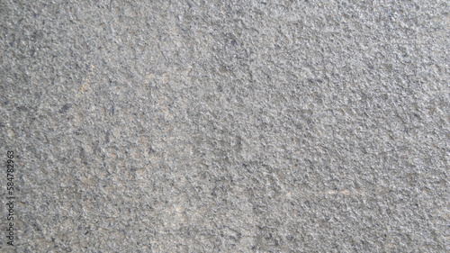 Close up macro view of rough grey stone surface. detailed nature background or pattern texture taken in natural environment.