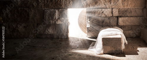 Empty tomb while light shines from the outside. Jesus Christ Resurrection. Christian Easter concept.