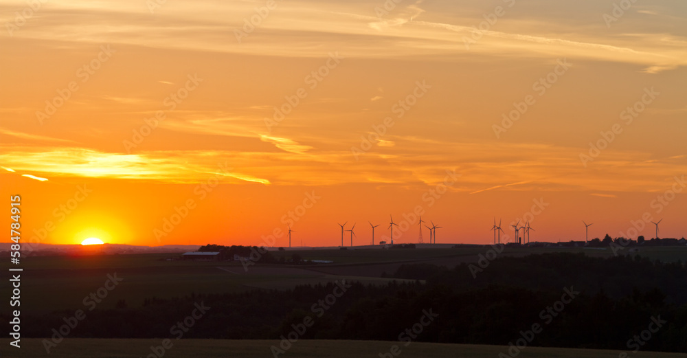 Wind generators at sunset, Pfalz, Germany