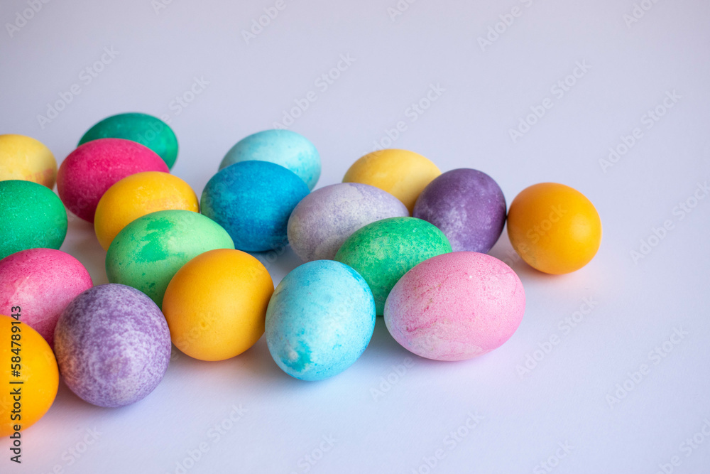 Happy Easter. Easter eggs on white background - Easter decoration, banner, panorama, background with space for text. Happy Easter. Easter eggs on white background - Easter decoration, banner, panorama, background with space for text.