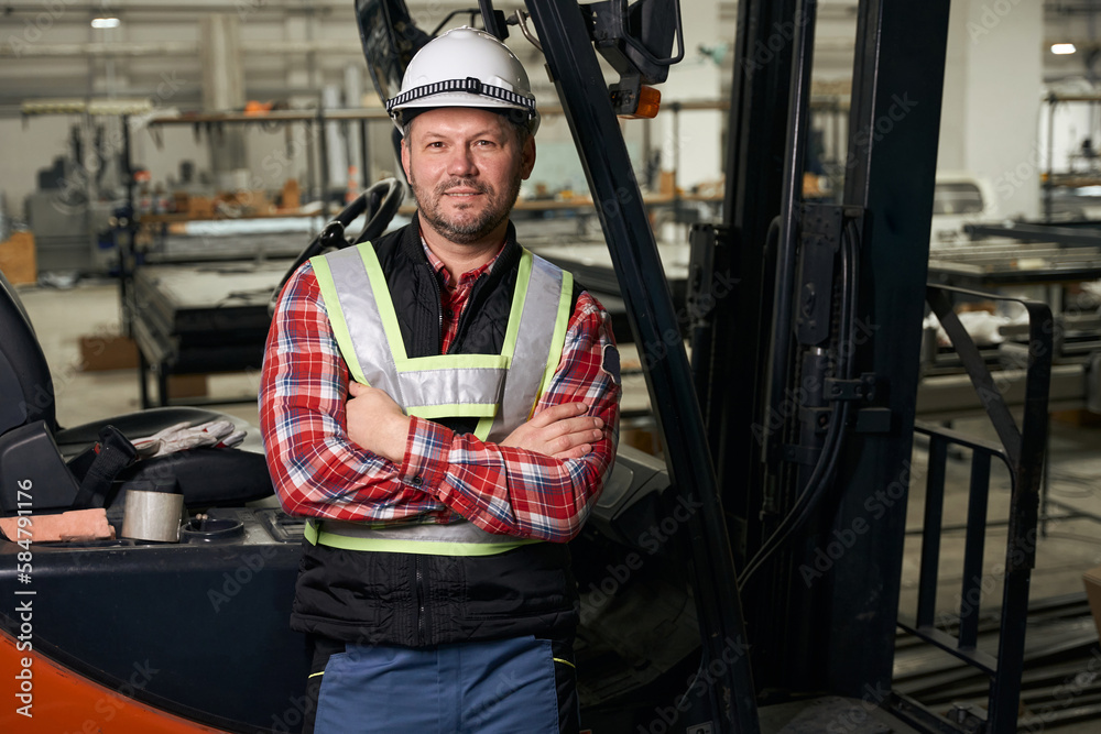 Portrait of male near loading truck at enterprise Portrait of male near loading truck at enterprise