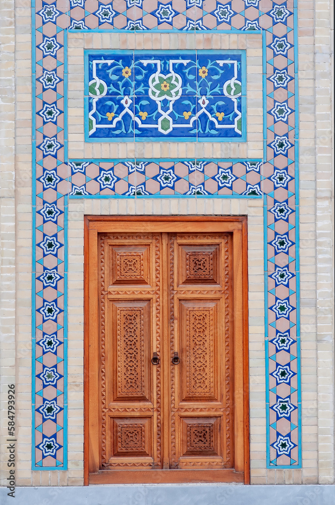 Asian Uzbekistan blue pattern. Wall decoration with door in Tashkent