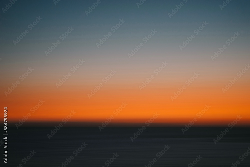 Motion Blurred Sunset over Ocean Motion Blurred Sunset over Ocean