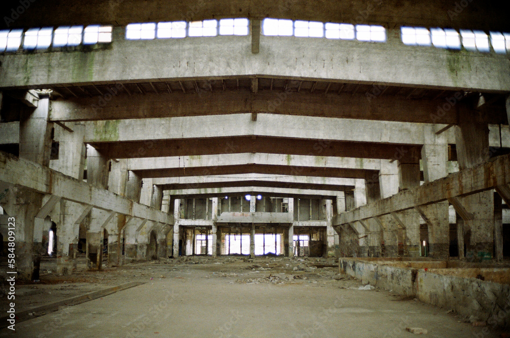 Inside abandoned industrial area with grey cement geometric colours Inside abandoned industrial area with grey cement geometric colours