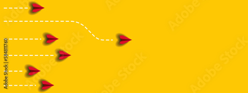 red airplane leading paper airplanes. red plane changing road. Different thinking, Business leader, personality development idea concept