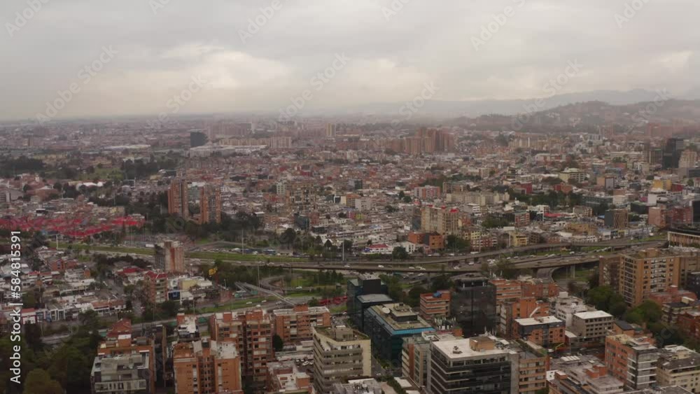 2022 - Excellent aerial view of downtown Bogota, Colombia and its busy highways on an overcast day. 2022 - Excellent aerial view of downtown Bogota, Colombia and its busy highways on an overcast day.