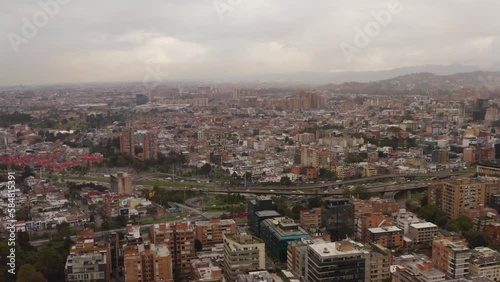 Wallpaper Mural 2022 - Excellent aerial view of downtown Bogota, Colombia and its busy highways on an overcast day. Torontodigital.ca