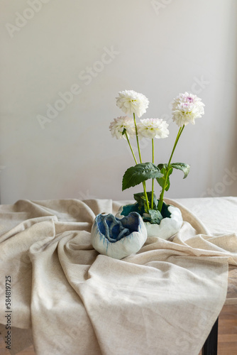 vase with flowers on the table