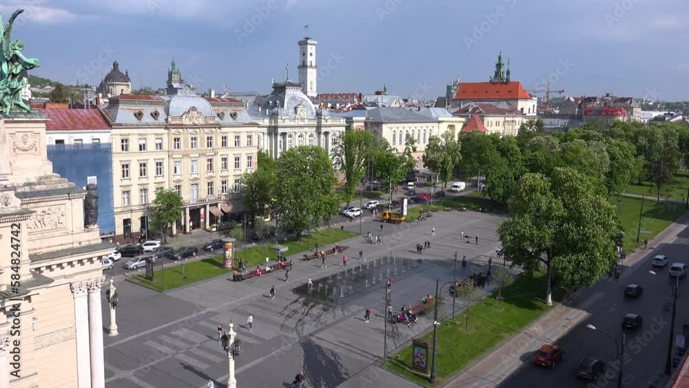 2022 - beautiful establishing cityscape skyline and historic opera house in Lviv, Ukraine. 2022 - beautiful establishing cityscape skyline and historic opera house in Lviv, Ukraine.