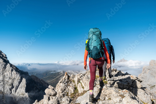 Mountaineer friends hiking photo