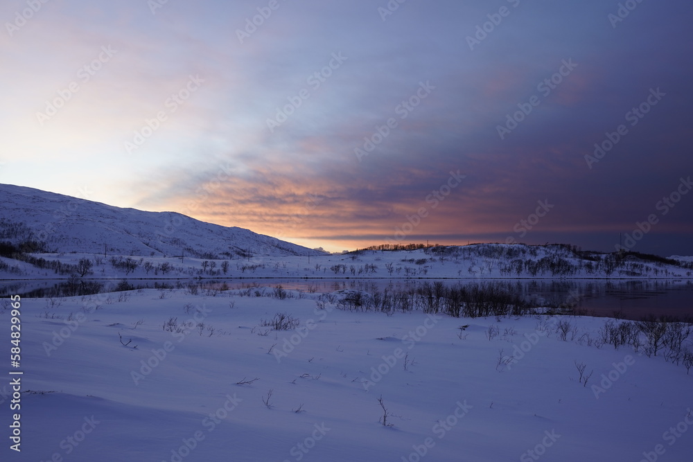 sunset time in snowy nature