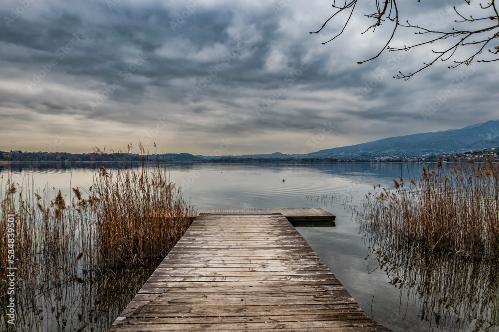 Fototapeta premium Wood catwalk on Lake Pusiano