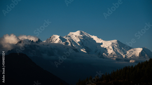 Landscape of Mont Blanc massif over the clouds at sunrise.