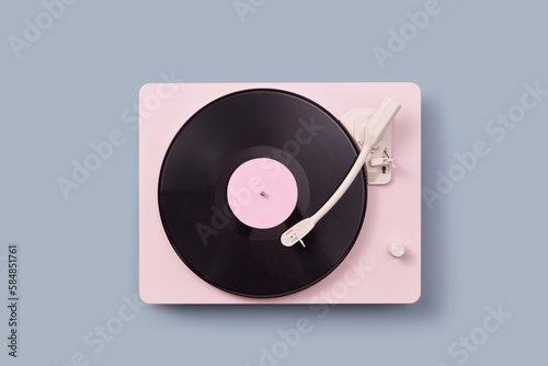 Pink record player with black vinyl plate.