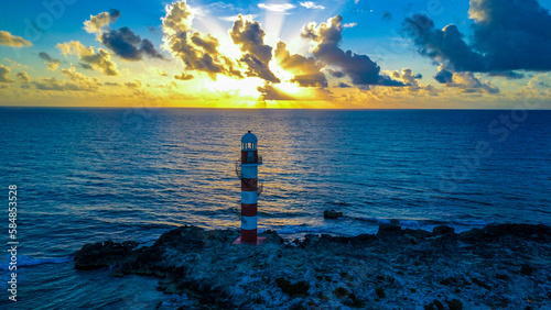 Lighthouse Sunrise over the Caribbean sea