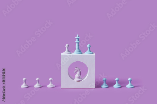 Chess pieces on white stone shape.