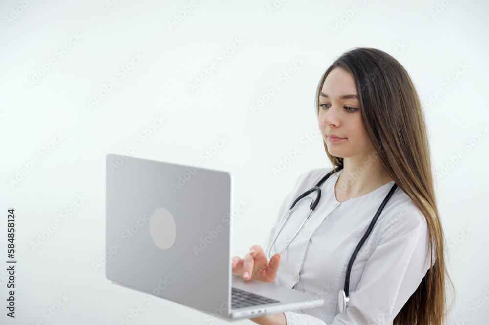 Shoulder view young woman consulting with family therapist doctor general practitioner online via video call on laptop after feeling first virus illness symptoms, medical insurance Shoulder view young woman consulting with family therapist doctor general practitioner online via video call on laptop after feeling first virus illness symptoms, medical insurance