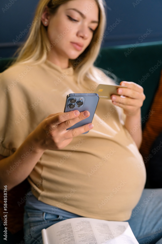 Pregnant Woman Transferring Money From A Credit Card Online Pregnant Woman Transferring Money From A Credit Card Online