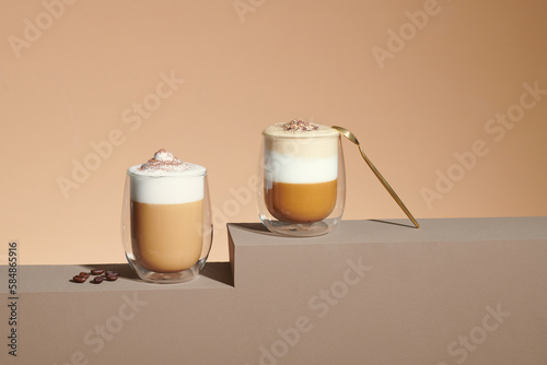 Various coffee drinks on brown background