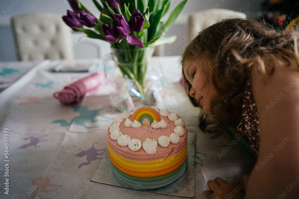 Little girl with birthday cake at home Little girl with birthday cake at home